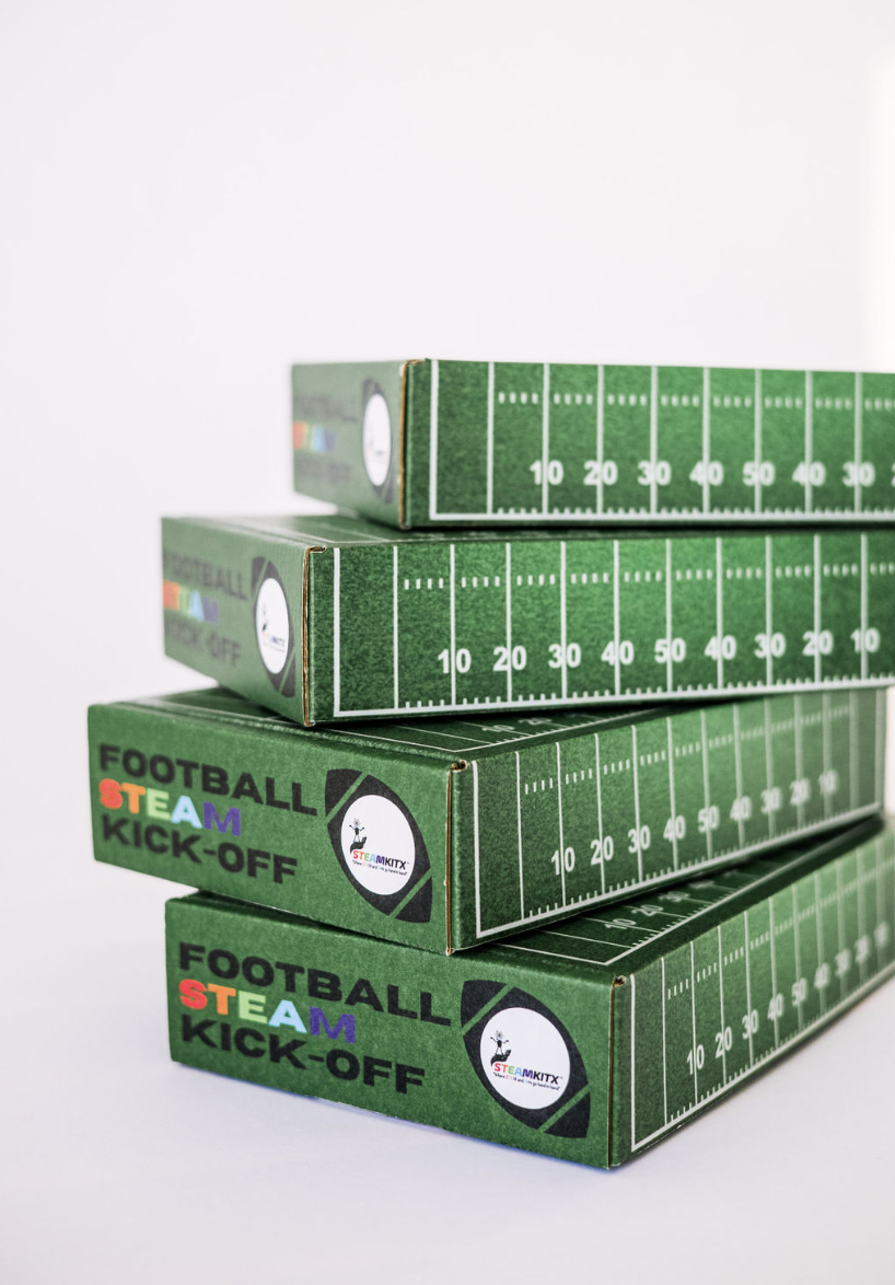 Stack of Football STEAM Kick-Off boxes